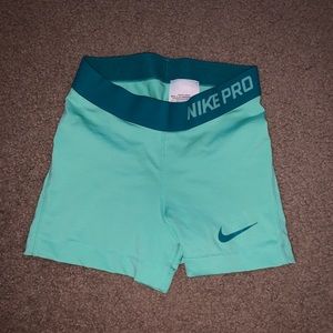 Teal nike pros